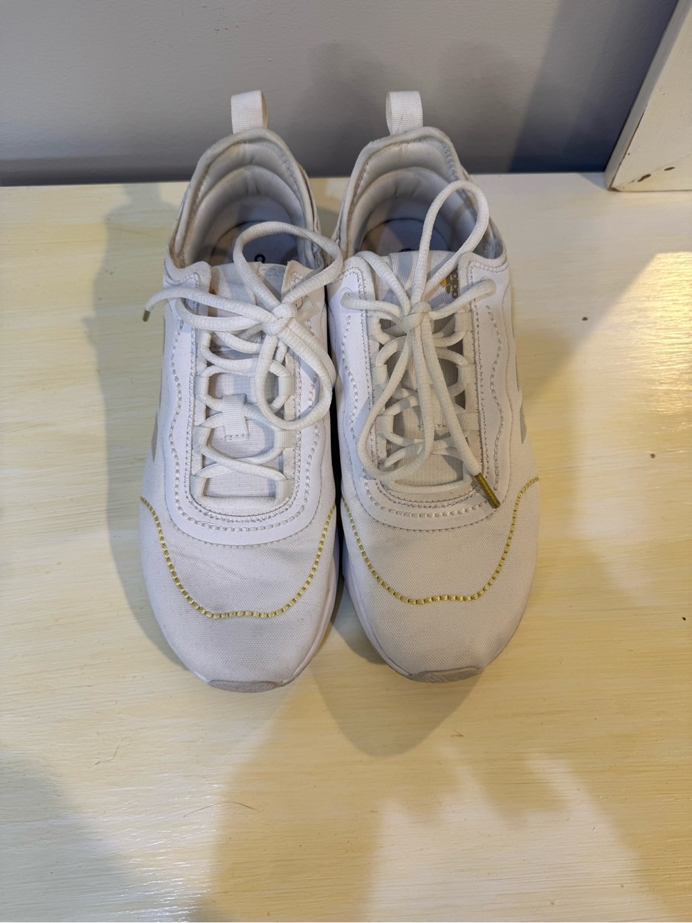 adidas Women's White Sneakers with Gold Accent
